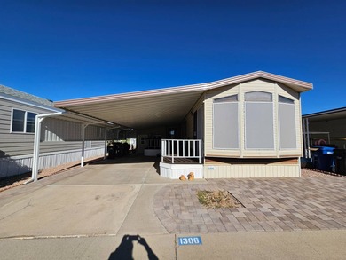 This charming 2-bedroom, 1.5-bathroom home features an open on Viewpoint Golf Resort in Arizona - for sale on GolfHomes.com, golf home, golf lot