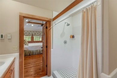 Wake up to crisp mountain air drifting through the windows and on Highlands Country Club in North Carolina - for sale on GolfHomes.com, golf home, golf lot