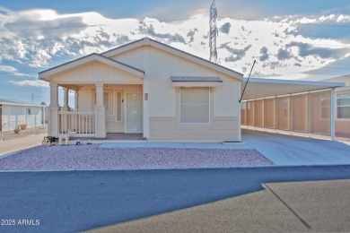 ON LEASED LAND:  Step into this nearly new 2022 Cavco on Sun City Riverview Golf Course in Arizona - for sale on GolfHomes.com, golf home, golf lot