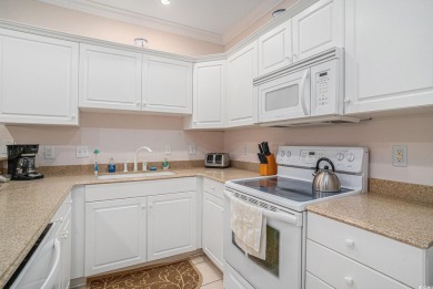 Beautiful second floor condo boasting an open floor plan. Don't on Tupelo Bay Golf Complex  in South Carolina - for sale on GolfHomes.com, golf home, golf lot