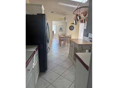 So much to love in this beautifully furnished 3-bed, 2-bath home on Sabal Springs Golf and Racquet Club in Florida - for sale on GolfHomes.com, golf home, golf lot