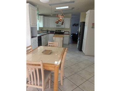 So much to love in this beautifully furnished 3-bed, 2-bath home on Sabal Springs Golf and Racquet Club in Florida - for sale on GolfHomes.com, golf home, golf lot