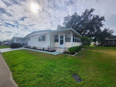 Shines bright like a diamond! Behind the beautiful glass entry on Grasslands Golf and Country Club in Florida - for sale on GolfHomes.com, golf home, golf lot