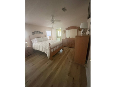 So much to love in this beautifully furnished 3-bed, 2-bath home on Sabal Springs Golf and Racquet Club in Florida - for sale on GolfHomes.com, golf home, golf lot