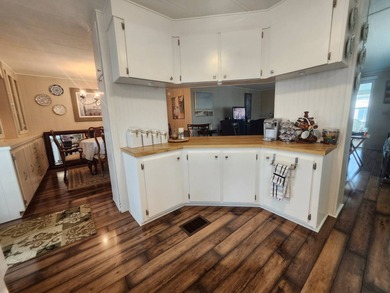 Shines bright like a diamond! Behind the beautiful glass entry on Grasslands Golf and Country Club in Florida - for sale on GolfHomes.com, golf home, golf lot