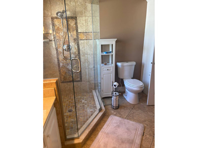 So much to love in this beautifully furnished 3-bed, 2-bath home on Sabal Springs Golf and Racquet Club in Florida - for sale on GolfHomes.com, golf home, golf lot