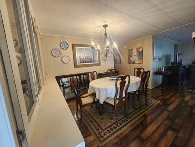 Shines bright like a diamond! Behind the beautiful glass entry on Grasslands Golf and Country Club in Florida - for sale on GolfHomes.com, golf home, golf lot