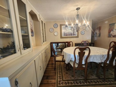 Shines bright like a diamond! Behind the beautiful glass entry on Grasslands Golf and Country Club in Florida - for sale on GolfHomes.com, golf home, golf lot