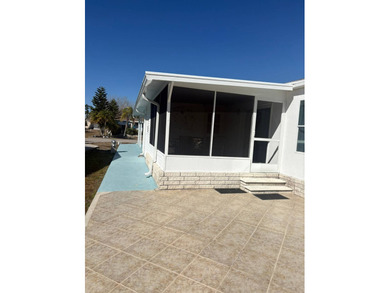 So much to love in this beautifully furnished 3-bed, 2-bath home on Sabal Springs Golf and Racquet Club in Florida - for sale on GolfHomes.com, golf home, golf lot