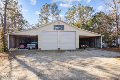 Discover this exquisite single-family home, built in 2004, that on Minnesott Golf and Country Club in North Carolina - for sale on GolfHomes.com, golf home, golf lot