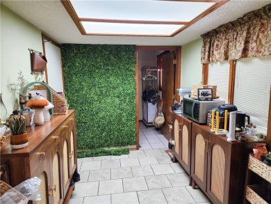 Charming 2-bed, 2-bath home in a quiet Bella Vista neighborhood on Bella Vista Country Club - Scottsdale in Arkansas - for sale on GolfHomes.com, golf home, golf lot