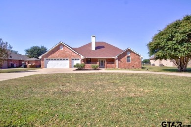 This beautiful 3-bedroom, 3-bathroom brick home in the heart of on Cedar Creek Country Club in Texas - for sale on GolfHomes.com, golf home, golf lot