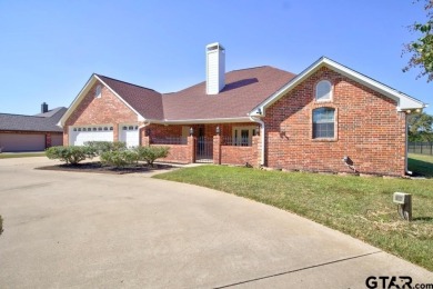 This beautiful 3-bedroom, 3-bathroom brick home in the heart of on Cedar Creek Country Club in Texas - for sale on GolfHomes.com, golf home, golf lot