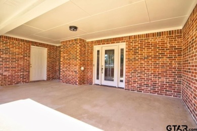 This beautiful 3-bedroom, 3-bathroom brick home in the heart of on Cedar Creek Country Club in Texas - for sale on GolfHomes.com, golf home, golf lot