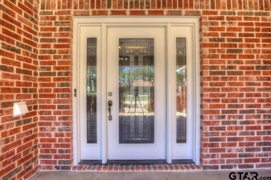 This beautiful 3-bedroom, 3-bathroom brick home in the heart of on Cedar Creek Country Club in Texas - for sale on GolfHomes.com, golf home, golf lot