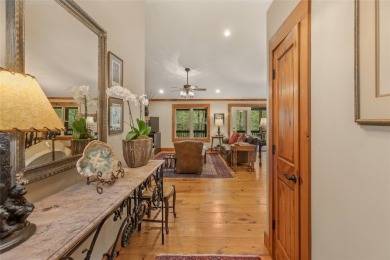 Enjoy an inviting three-bedroom, two-bathroom Arts and Crafts on Sapphire National Golf Club in North Carolina - for sale on GolfHomes.com, golf home, golf lot