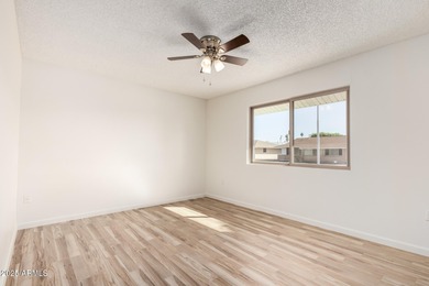 Beautifully updated home in Sun City's 55+ community. Fresh on Sun City Lakes West and East in Arizona - for sale on GolfHomes.com, golf home, golf lot