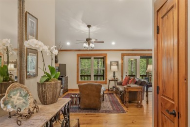 Enjoy an inviting three-bedroom, two-bathroom Arts and Crafts on Sapphire National Golf Club in North Carolina - for sale on GolfHomes.com, golf home, golf lot