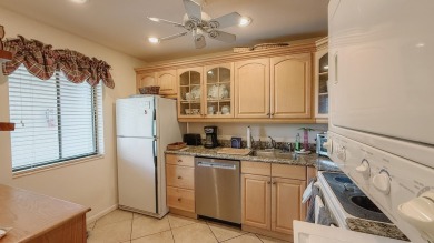 Beautifully renovated and FULLY FURNISHED  offered turn-key on Fountains Golf and Country Club in Florida - for sale on GolfHomes.com, golf home, golf lot