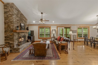 Enjoy an inviting three-bedroom, two-bathroom Arts and Crafts on Sapphire National Golf Club in North Carolina - for sale on GolfHomes.com, golf home, golf lot