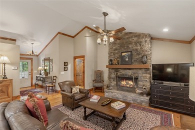 Enjoy an inviting three-bedroom, two-bathroom Arts and Crafts on Sapphire National Golf Club in North Carolina - for sale on GolfHomes.com, golf home, golf lot