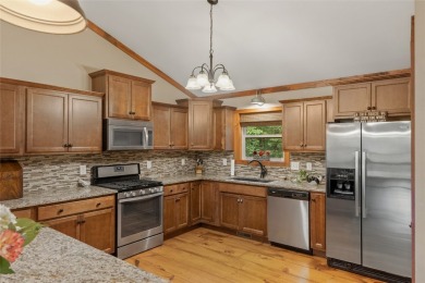 Enjoy an inviting three-bedroom, two-bathroom Arts and Crafts on Sapphire National Golf Club in North Carolina - for sale on GolfHomes.com, golf home, golf lot