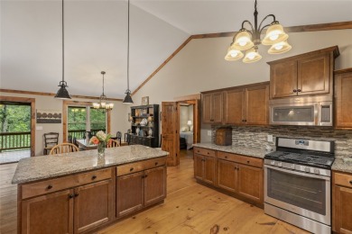 Enjoy an inviting three-bedroom, two-bathroom Arts and Crafts on Sapphire National Golf Club in North Carolina - for sale on GolfHomes.com, golf home, golf lot