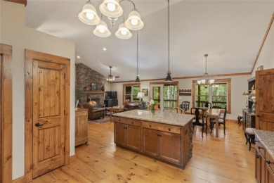 Enjoy an inviting three-bedroom, two-bathroom Arts and Crafts on Sapphire National Golf Club in North Carolina - for sale on GolfHomes.com, golf home, golf lot