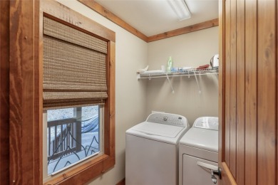 Enjoy an inviting three-bedroom, two-bathroom Arts and Crafts on Sapphire National Golf Club in North Carolina - for sale on GolfHomes.com, golf home, golf lot