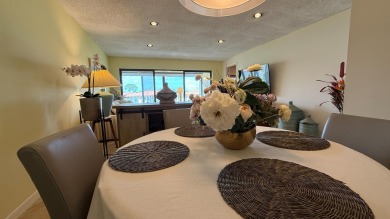 Beautifully renovated and FULLY FURNISHED  offered turn-key on Fountains Golf and Country Club in Florida - for sale on GolfHomes.com, golf home, golf lot