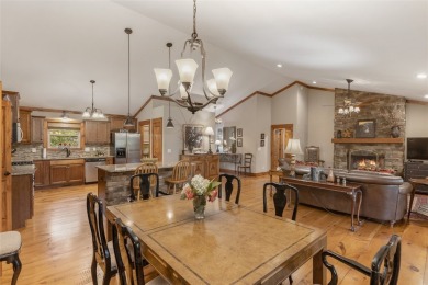 Enjoy an inviting three-bedroom, two-bathroom Arts and Crafts on Sapphire National Golf Club in North Carolina - for sale on GolfHomes.com, golf home, golf lot