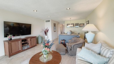 Beautifully renovated and FULLY FURNISHED  offered turn-key on Fountains Golf and Country Club in Florida - for sale on GolfHomes.com, golf home, golf lot