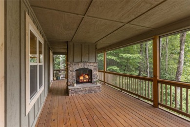 Enjoy an inviting three-bedroom, two-bathroom Arts and Crafts on Sapphire National Golf Club in North Carolina - for sale on GolfHomes.com, golf home, golf lot