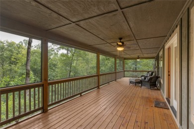 Enjoy an inviting three-bedroom, two-bathroom Arts and Crafts on Sapphire National Golf Club in North Carolina - for sale on GolfHomes.com, golf home, golf lot