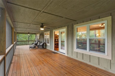 Enjoy an inviting three-bedroom, two-bathroom Arts and Crafts on Sapphire National Golf Club in North Carolina - for sale on GolfHomes.com, golf home, golf lot