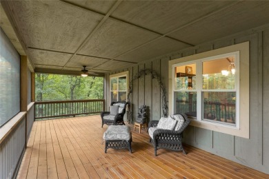 Enjoy an inviting three-bedroom, two-bathroom Arts and Crafts on Sapphire National Golf Club in North Carolina - for sale on GolfHomes.com, golf home, golf lot