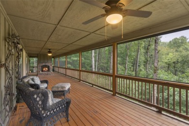 Enjoy an inviting three-bedroom, two-bathroom Arts and Crafts on Sapphire National Golf Club in North Carolina - for sale on GolfHomes.com, golf home, golf lot