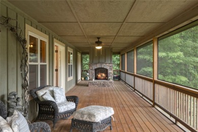Enjoy an inviting three-bedroom, two-bathroom Arts and Crafts on Sapphire National Golf Club in North Carolina - for sale on GolfHomes.com, golf home, golf lot