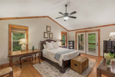 Enjoy an inviting three-bedroom, two-bathroom Arts and Crafts on Sapphire National Golf Club in North Carolina - for sale on GolfHomes.com, golf home, golf lot
