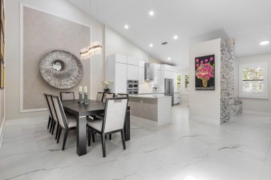 This stylishly renovated penthouse condo blends modern finishes on Polo Club of Boca Raton in Florida - for sale on GolfHomes.com, golf home, golf lot