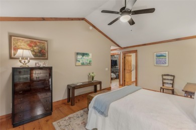 Enjoy an inviting three-bedroom, two-bathroom Arts and Crafts on Sapphire National Golf Club in North Carolina - for sale on GolfHomes.com, golf home, golf lot