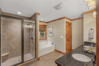 Enjoy an inviting three-bedroom, two-bathroom Arts and Crafts on Sapphire National Golf Club in North Carolina - for sale on GolfHomes.com, golf home, golf lot