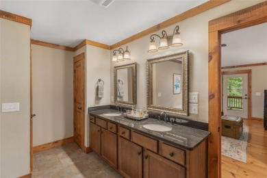 Enjoy an inviting three-bedroom, two-bathroom Arts and Crafts on Sapphire National Golf Club in North Carolina - for sale on GolfHomes.com, golf home, golf lot