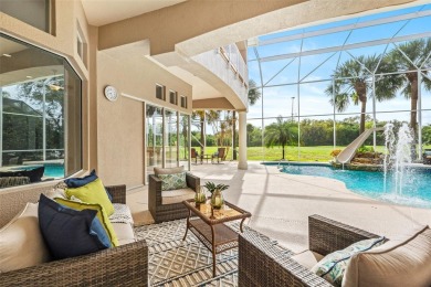 Nestled on picturesque greens of a prestigious golf course, this on Baytree National Golf Links in Florida - for sale on GolfHomes.com, golf home, golf lot