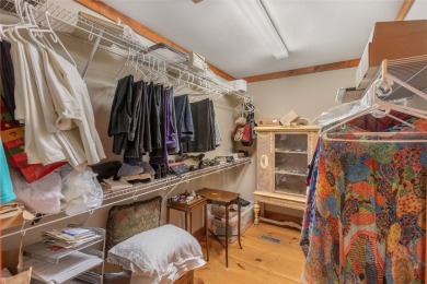 Enjoy an inviting three-bedroom, two-bathroom Arts and Crafts on Sapphire National Golf Club in North Carolina - for sale on GolfHomes.com, golf home, golf lot