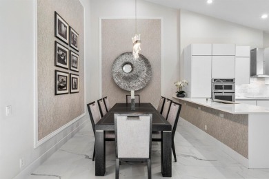 This stylishly renovated penthouse condo blends modern finishes on Polo Club of Boca Raton in Florida - for sale on GolfHomes.com, golf home, golf lot