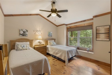 Enjoy an inviting three-bedroom, two-bathroom Arts and Crafts on Sapphire National Golf Club in North Carolina - for sale on GolfHomes.com, golf home, golf lot