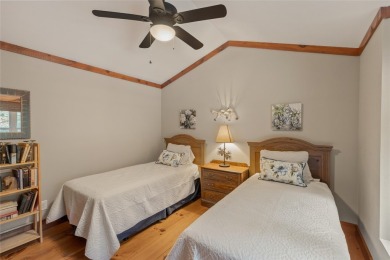 Enjoy an inviting three-bedroom, two-bathroom Arts and Crafts on Sapphire National Golf Club in North Carolina - for sale on GolfHomes.com, golf home, golf lot