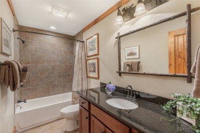 Enjoy an inviting three-bedroom, two-bathroom Arts and Crafts on Sapphire National Golf Club in North Carolina - for sale on GolfHomes.com, golf home, golf lot