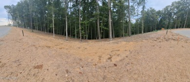 Build your dream home on this beautiful .96 acre wooded lot on  in Tennessee - for sale on GolfHomes.com, golf home, golf lot